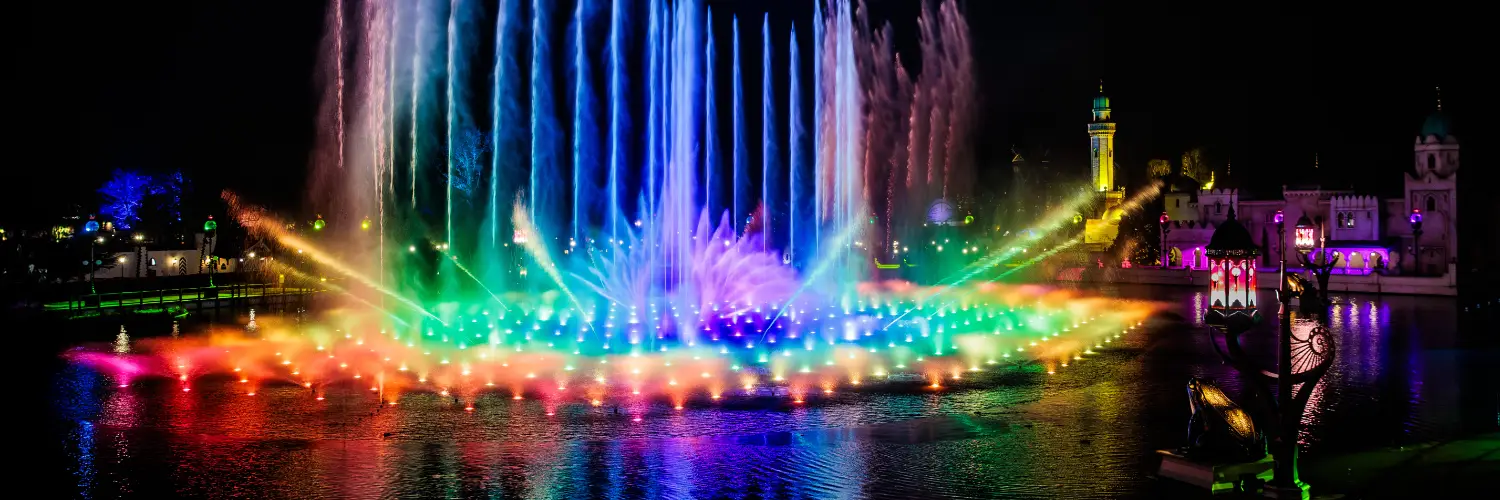 a water fountain with colorful lights